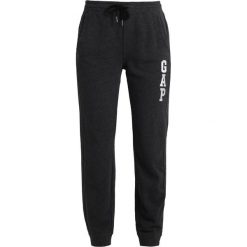 GAP Spodnie treningowe charcoal heather. Niebieskie spodnie dresowe marki comma casual identity, z materiału, casualowe. W wyprzedaży za 152.10 zł.