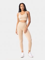 Carpatree Legginsy sportowe "Simply" w kolorze beżowym rozmiar: S. Brązowe legginsy Carpatree, bez wzorów, z materiału, sportowe. Za 135.81 zł.