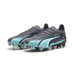 Buty piłkarskie PUMA ULTRA ULTIMATE RUSH FG/AG. Białe buty treningowe Puma, bez wzorów, bez zapięcia, do piłki nożnej. Za 449.99 zł.