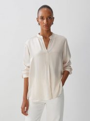 Someday Bluzka w kolorze kremowym rozmiar: 40. Brązowe bluzki someday., bez wzorów, z wiskozy, bez kołnierzyka, bez ramiączek. Za 166.49 zł.