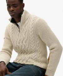 Superdry Sweter Jacob z warkoczowym splotem i półzamkiem — Slim fit z wełną i. Brązowe swetry Superdry, xl, z aplikacjami, z wełny, eleganckie, bez ramiączek. Za 408.75 zł.