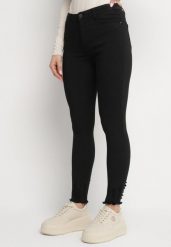 Czarne Jeansy z Wiskozą o Kroju Skinny z Przetarciami Taledis. Czarne jeansy Born2be, bez wzorów, z jeansu, eleganckie, z podwyższonym stanem. W wyprzedaży za 72.24 zł.