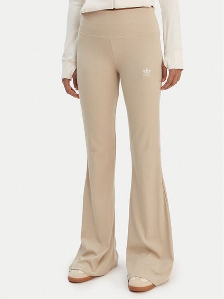 Adidas Legginsy Essentials KD3850 Beżowy Flared Leg. Brązowe legginsy adidas, bez wzorów, z bawełny. Za 219.99 zł.