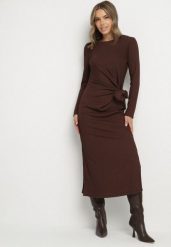 Brązowa Taliowana Sukienka z Ozdobnym Wiązaniem i Rozcięciami Esilda. Brązowe sukienki Born2be, na co dzień, m, bez wzorów, eleganckie, bez kołnierzyka, bez ramiączek. Za 109.99 zł.