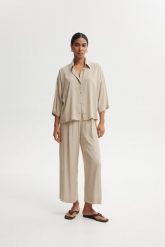 SPODNIE ZORA PIASKOWE XL - Flawless. Spodnie materiałowe Flawless, bez wzorów, z gumy. Za 389.00 zł.