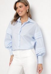 Jasnoniebieska Koszula z Bawełną Ozdobiona Szerokimi Rękawami Edimelia. Niebieskie koszule Born2be, m, bez wzorów, z bawełny, eleganckie, bez kołnierzyka, bez ramiączek. W wyprzedaży za 84.99 zł.