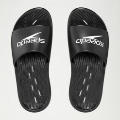 Klapki basenowe antypoślizgowe damskie Speedo Slides. Czarne klapki Speedo, bez wzorów, z materiału, bez obcasa, bez zapięcia. Za 68.59 zł.