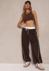 Brązowe Dresowe Spodnie z Wiskozą High Waist Ozdobione Lampasami Maiviona. Brązowe jeansy Renee, bez wzorów, z dresówki, sportowe, z podwyższonym stanem. W wyprzedaży za 74.99 zł.