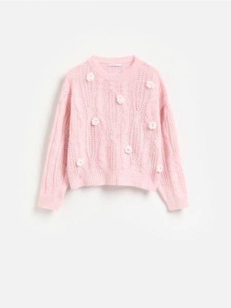 Sweter z kwiatową aplikacją - różowy. Czerwone swetry Reserved, l, z aplikacjami, z dzianiny, bez ramiączek. Za 129.99 zł.