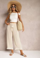 Beżowe Szerokie Spodnie High Waist z Gumką w Pasie Jolfea. Brązowe jeansy Renee, l, bez wzorów, z jeansu, eleganckie, z podwyższonym stanem. W wyprzedaży za 29.99 zł.