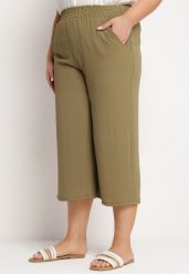 Ciemnozielone Szerokie Spodnie z Wysokim Stanem z Gumką w Talii i Nogawkami Długości 3/4 Levolia. Zielone jeansy Born2be, plus size, bez wzorów, z jeansu, eleganckie, z podwyższonym stanem. Za 54.99 zł.