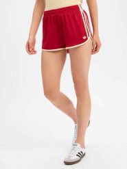 Adidas Originals spodenki sportowe Kobiety Sztuczne włókno czerwony, L. Czerwone szorty sportowe adidas Originals, bez wzorów, z włókna, do biegania. Za 179.95 zł.