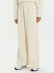 Lacoste Spodnie dresowe XF2657 Écru Wide Leg. Spodnie dresowe Lacoste, bez wzorów, z bawełny. Za 359.99 zł.