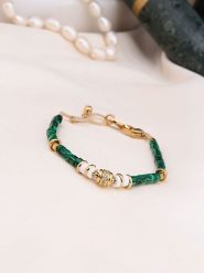 Charlize Pozłacana bransoletka z malachitami rozmiar: onesize. Zielone bransoletki Charlize, z malachitem, pozłacane. Za 78.47 zł.
