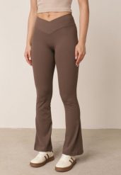Brązowe Legginsy o Fasonie Dzwonów z Wysokim Stanem Jaenlenne. Brązowe legginsy Born2be, bez wzorów, z jeansu, biznesowe. Za 79.99 zł.