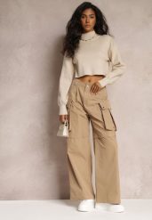 Beżowe Szerokie Spodnie High Waist w Stylu Cargo Vomisal. Brązowe jeansy Renee, na zimę, l, bez wzorów, z jeansu, z podwyższonym stanem. W wyprzedaży za 103.99 zł.