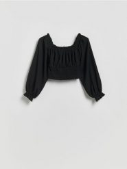 Bluzka z marszczeniem - czarny. Czarne bluzki Reserved, l, bez wzorów, z dzianiny, bez kołnierzyka, bez ramiączek. Za 59.99 zł.