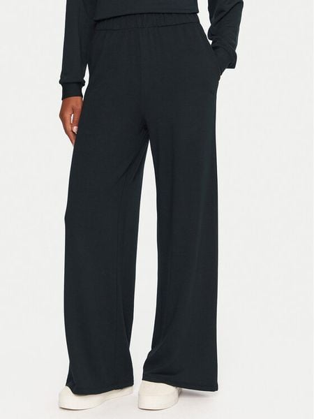 Roxy Spodnie dresowe Surfing By Sunlight ERJFB03495 Czarny Wide Leg. Czarne spodnie dresowe Roxy, bez wzorów, z dresówki. Za 159.99 zł.