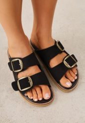 Czarne Klapki VICES Ozdobione Dużymi Klamrami Jenniviane. Czarne klapki Renee, bez wzorów, z jeansu, eleganckie, bez obcasa, na płaskiej podeszwie, bez zapięcia. Za 99.99 zł.