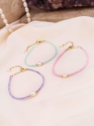 Pierres de Jade Pozłacane bransoletki (3 szt.) z perłami i kryształami rozmiar: onesize. Niebieskie bransoletki Pierres de Jade, z kryształem, pozłacane. Za 30.99 zł.