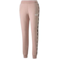 Spodnie damskie Puma Power Tape FL. Czerwone spodnie dresowe Puma, bez wzorów, długie. Za 148.99 zł.
