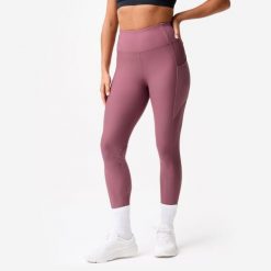 Legginsy fitness damskie Domyos. Fioletowe legginsy DOMYOS, bez wzorów, z elastanu, sportowe. Za 79.99 zł.