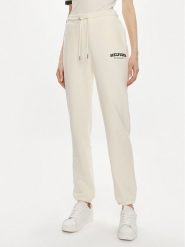 Tommy Hilfiger Spodnie dresowe Monotype WW0WW41572 Beżowy Regular Fit. Brązowe spodnie dresowe Tommy Hilfiger, bez wzorów, z bawełny. Za 389.99 zł.