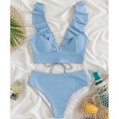 Dwuczęściowy strój kąpielowy z falbankami i wysoką talią Iolanthe. Niebieskie bikini Intica, bez wzorów, z materiału, wakacyjne. Za 149.00 zł.