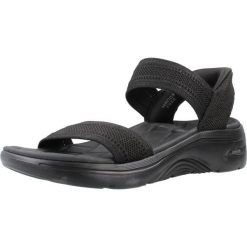 Sandały damskie, Slip-Ins: GO Walk Arch Fit 2.0 Sandal - Kennedy. Czarne sandały Skechers, bez wzorów, z materiału, sportowe, bez obcasa, bez zapięcia. Za 279.99 zł.