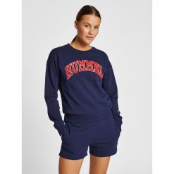 Bluza dla kobiet Hummel hmlIC Billie. Niebieskie bluzy Hummel, m, bez wzorów, retro, bez ramiączek, bez kaptura. W wyprzedaży za 154.45 zł.