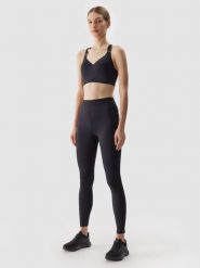 4F Legginsy treningowe z materiału z recyklingu damskie - czarne XS. Czarne legginsy 4f, bez wzorów, z dzianiny, sportowe. W wyprzedaży za 69.99 zł.