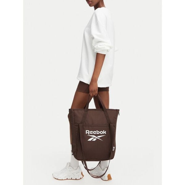 Torebka Reebok. Brązowe shopper bag Reebok, bez wzorów, bez dodatków. Za 129.99 zł.