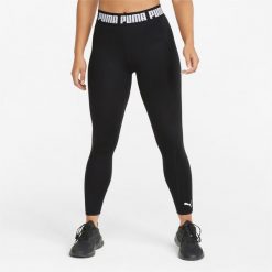 Legginsy treningowe damskie PUMA Train Strong HW Tight. Czarne legginsy Puma, bez wzorów, sportowe. Za 208.95 zł.