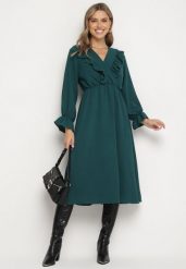 Ciemnozielona Rozkloszowana Sukienka z Gumką w Talii z Kopertowym Dekoltem i Falbanką Florisse. Zielone sukienki Born2be, na co dzień, bez wzorów, eleganckie, bez kołnierzyka, bez ramiączek, midi, kopertowe. W wyprzedaży za 63.74 zł.