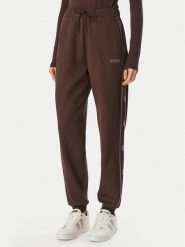 Guess Spodnie dresowe V5BB23 KCX22 Brązowy Regular Fit. Brązowe spodnie dresowe Guess, z aplikacjami, z dresówki. Za 474.99 zł.