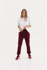 LEKKIE SPODNIE CELINE BORDOWE XS - Flawless. Czerwone spodnie dresowe Flawless, bez wzorów, z bawełny, klasyczne. Za 231.00 zł.