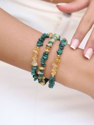 Pierres de Jade Pozłacana bransoletka z elementami ozdobnymi rozmiar: onesize. Zielone bransoletki Pierres de Jade, z cytrynem, pozłacane. Za 92.64 zł.