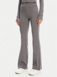Guess Spodnie dresowe V5RB15 KCD02 Szary Regular Fit. Szare spodnie dresowe Guess, z aplikacjami, z dresówki. Za 299.99 zł.