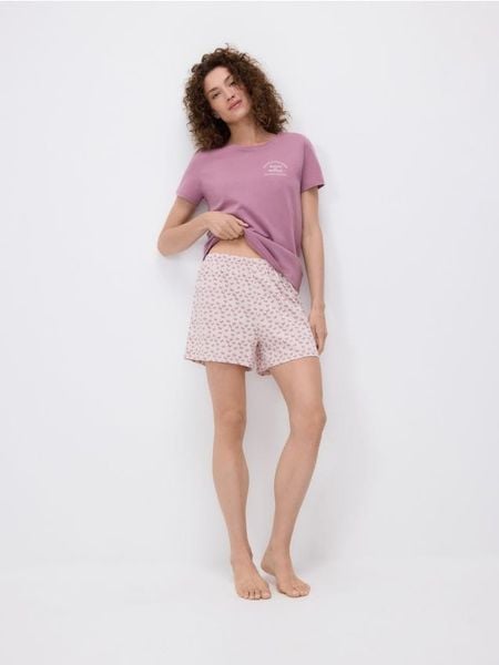 Dwuczęściowa piżama z nadrukiem - jasnofioletowy. Fioletowe piżamy Reserved, l, bez wzorów, z bawełny, bez kołnierzyka, bez ramiączek. W wyprzedaży za 35.99 zł.