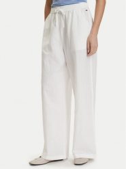 Tommy Jeans Spodnie materiałowe DW0DW22285 Biały Loose Fit. Białe spodnie materiałowe Tommy Jeans, bez wzorów, z jeansu. Za 409.99 zł.