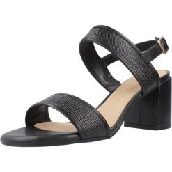 Sandały Clarks Model Ezoria Sling Kolor Czarny. Czarne sandały Clarks, bez wzorów, ze skóry, bez obcasa, na obcasie, bez zapięcia. Za 369.55 zł.