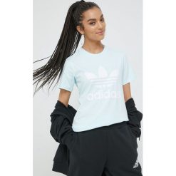 Adidas Originals t-shirt damski. Niebieskie t-shirty adidas Originals, bez wzorów, z bawełny, bez kołnierzyka, bez ramiączek. W wyprzedaży za 104.99 zł.