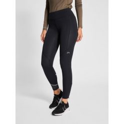 Legginsy damskie Newline Chicago. Brązowe legginsy Newline, bez wzorów, z dżerseju. Za 340.05 zł.