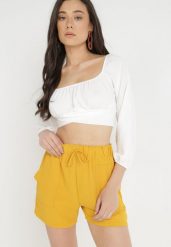 Żółte Szorty Hellitrite. Żółte szorty Born2be, bez wzorów, eleganckie. Za 49.99 zł.