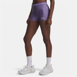 Spodenki treningowe damskie Under Armour HeatGear Shorty. Fioletowe szorty sportowe Under Armour, bez wzorów, na fitness i siłownię. Za 94.99 zł.