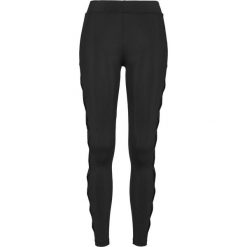 Damskie klasyczne legginsy miejskie w prążki. Czarne legginsy sportowe Urban Classics, bez wzorów. Za 160.50 zł.