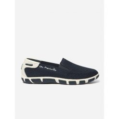 Buty sportowe damskie TBS Slip-on. Niebieskie buty sportowe lifestyle TBS, bez wzorów, sportowe, bez zapięcia. Za 399.00 zł.