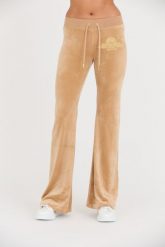 JUICY COUTURE Beżowe spodnie Arched Metallic Layla. Brązowe spodnie dresowe Juicy Couture, bez wzorów, z dresówki. W wyprzedaży za 349.99 zł.