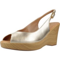 Sandały UNISA RACHEL LMT Złoty. Żółte sandały Unisa, bez wzorów, ze skóry, sportowe, bez obcasa, bez zapięcia. Za 390.99 zł.