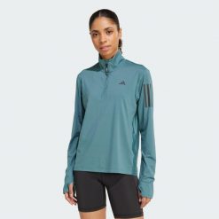 Kurtka Own the Run Half-Zip. Niebieskie kurtki do biegania adidas, xs, bez wzorów, z materiału, bez kaptura, do biegania. W wyprzedaży za 164.25 zł.